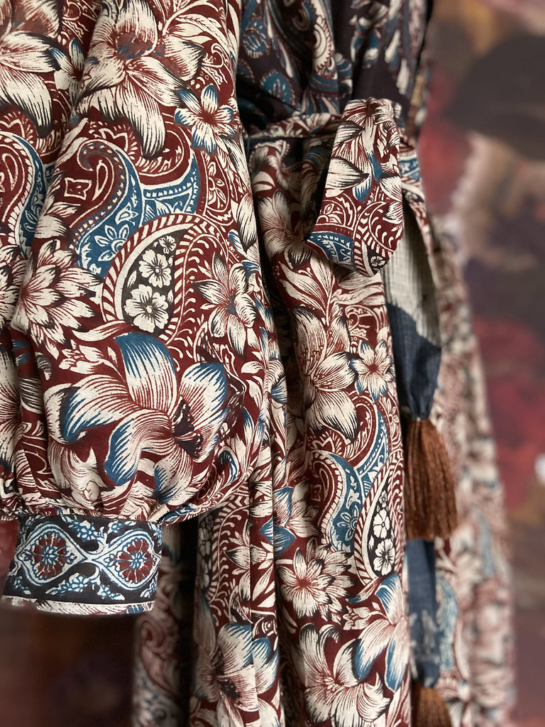 Slate blue and burnt sienna kalamkari and batik cotton reversible robe with very full bishop sleeves. Bohemian style from the Pavilion Parade studio. 