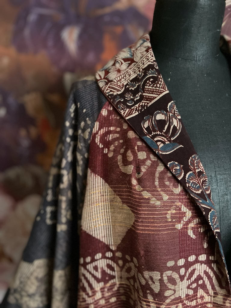Slate blue and burnt sienna kalamkari and batik cotton reversible robe with very full bishop sleeves. Bohemian style from the Pavilion Parade studio. 