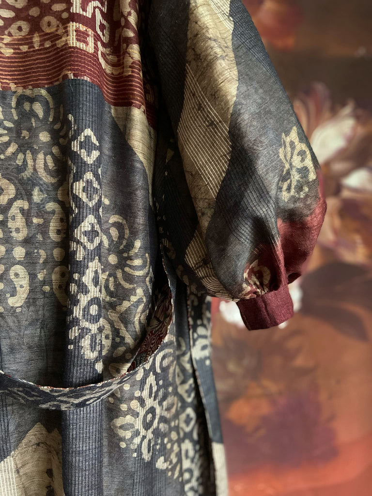 Slate blue and burnt sienna kalamkari and batik cotton reversible robe with very full bishop sleeves. Bohemian style from the Pavilion Parade studio. 