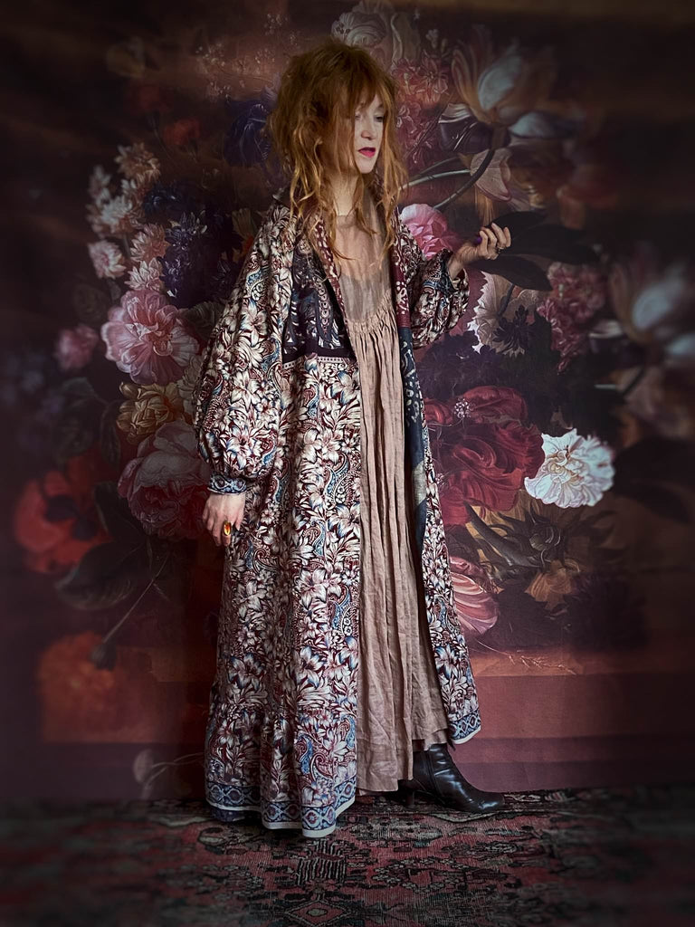 Slate blue and burnt sienna kalamkari and batik cotton reversible robe with very full bishop sleeves. Bohemian style from the Pavilion Parade studio. 