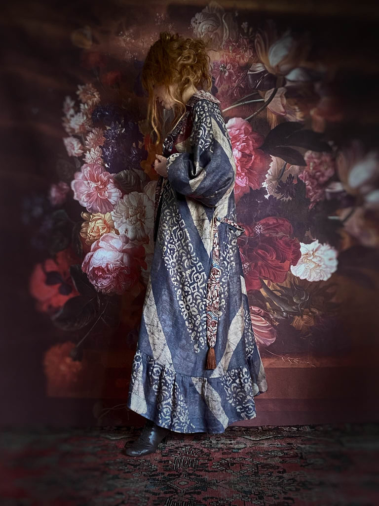 Slate blue and burnt sienna kalamkari and batik cotton reversible robe with very full bishop sleeves. Bohemian style from the Pavilion Parade studio. 