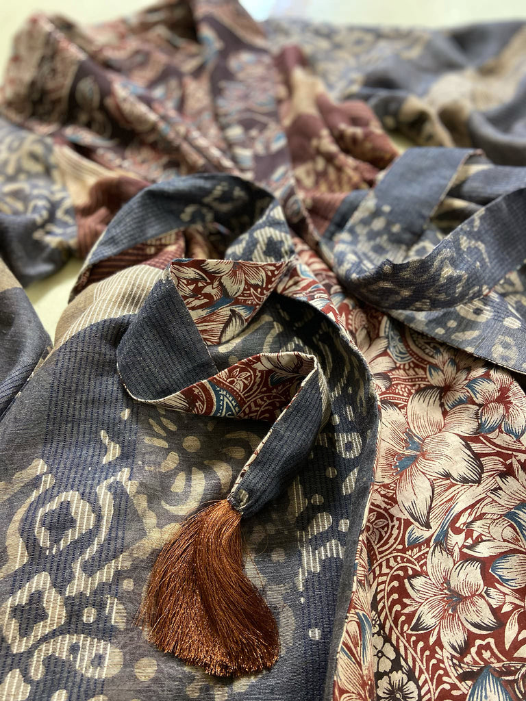 Slate blue and burnt sienna kalamkari and batik cotton reversible robe with very full bishop sleeves. Bohemian style from the Pavilion Parade studio. 