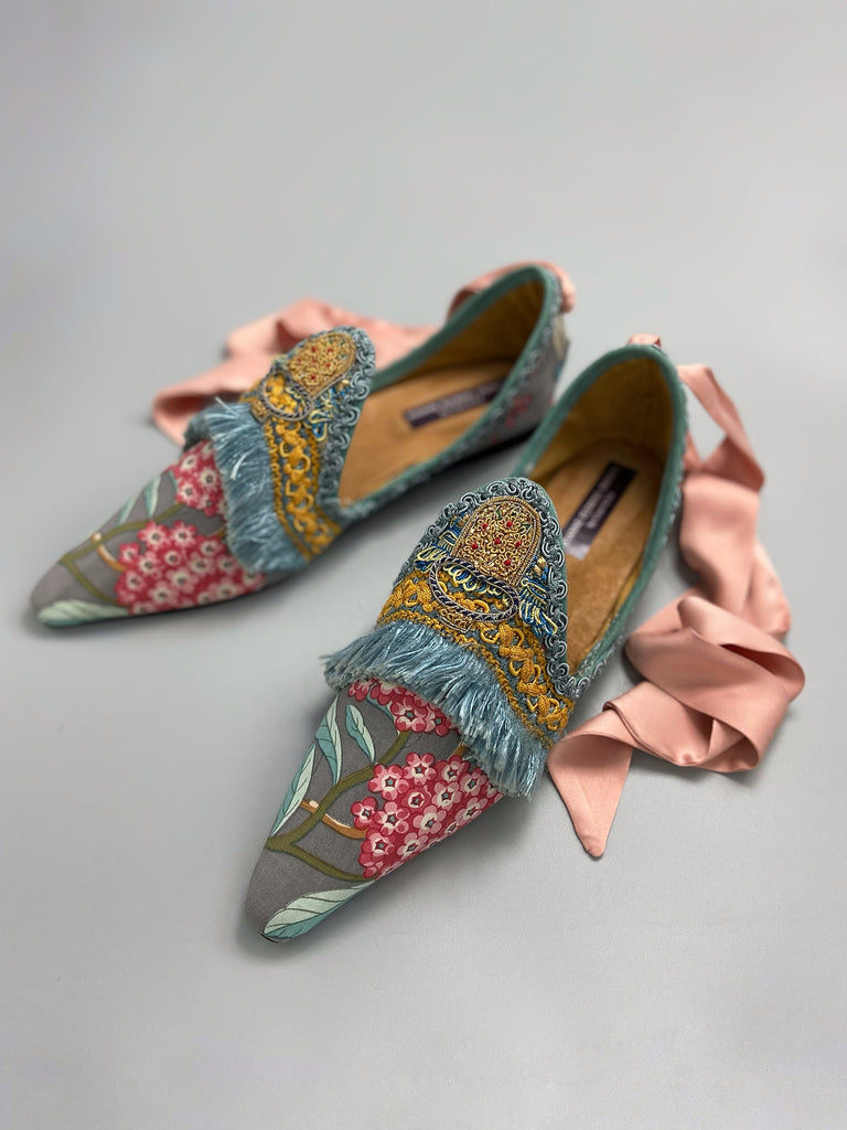 Mitsou Pavilion Parade handmade shoes created from antique textiles,  available from Joanne Fleming Design. Antique French cintz and 19th century passementerie create bohemian flat shoes in shades of pink and teal