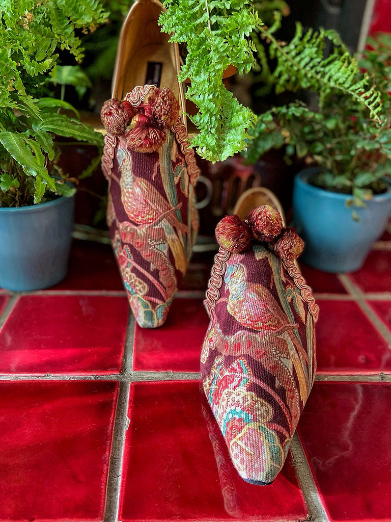 Audubon aubergine and teal shoes with pompom tassel embellishment, created from antique textiles, from the Signature Collection of bohemian footwear by Pavilion Parade at Joanne Fleming Design