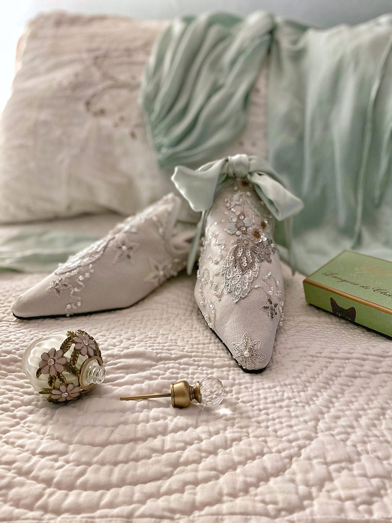 Enchanted Forest limited edition couture bridal shoes from the Pavilion Parade Recherché Collection by Joanne Fleming Design | silver grey silk satin with green ankle ties and beaded embellishment