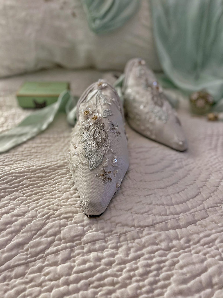 Enchanted Forest limited edition couture bridal shoes from the Pavilion Parade Recherché Collection by Joanne Fleming Design | silver grey silk satin with green ankle ties and beaded embellishment