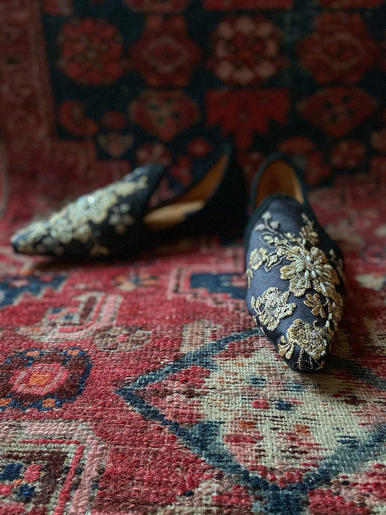 Limited edition beaded embroidered flat babouche style evening shoes in black and gold. Pavilion Parade Recherché Collection from Joanne Fleming Design
