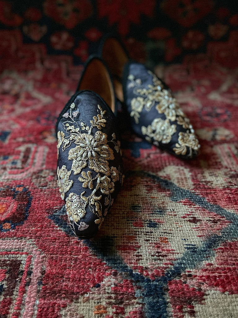 Limited edition beaded embroidered flat babouche style evening shoes in black and gold. Pavilion Parade Recherché Collection from Joanne Fleming Design
