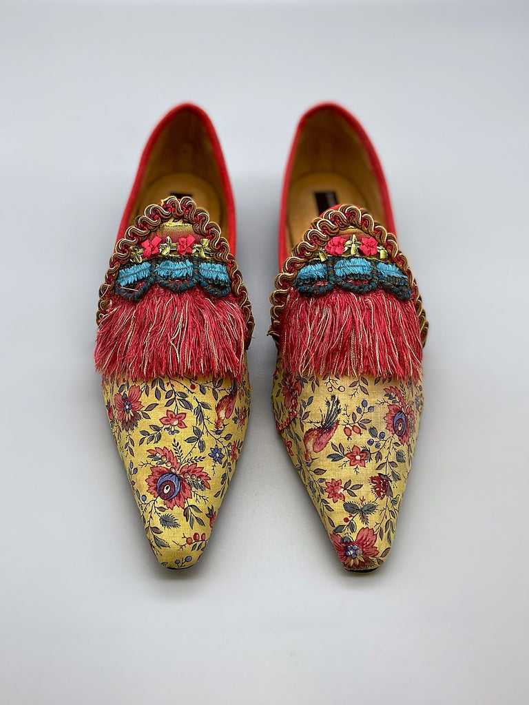 Xanadu yellow and floral shoes with fringed embellishment, created from antique textiles, from the Sigtnature Collection of bohemian footwear by Pavilion Parade at Joanne Fleming Design
