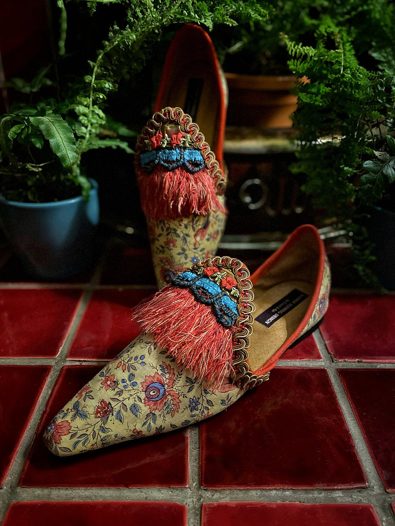 Xanadu yellow and floral shoes with fringed embellishment, created from antique textiles, from the Sigtnature Collection of bohemian footwear by Pavilion Parade at Joanne Fleming Design