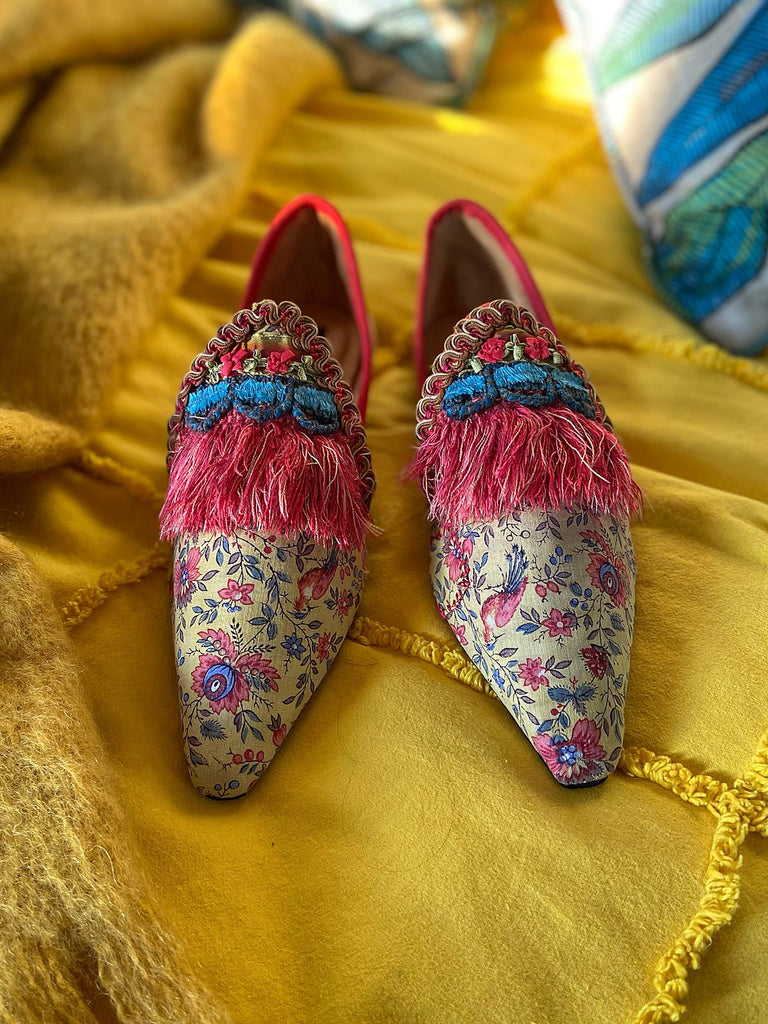 Xanadu yellow and floral shoes with fringed embellishment, created from antique textiles, from the Sigtnature Collection of bohemian footwear by Pavilion Parade at Joanne Fleming Design