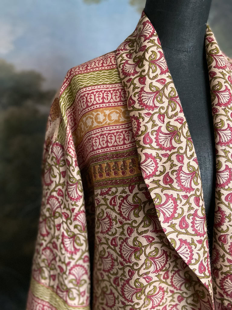 Rose pink and ivory fine wool dressing robe or duster coat with tassel sash, wide sleeves and deep pockets. Lined in silk. Bohemian style sustainably created from antique and vintage textiles by the Pavilion Parade studio.