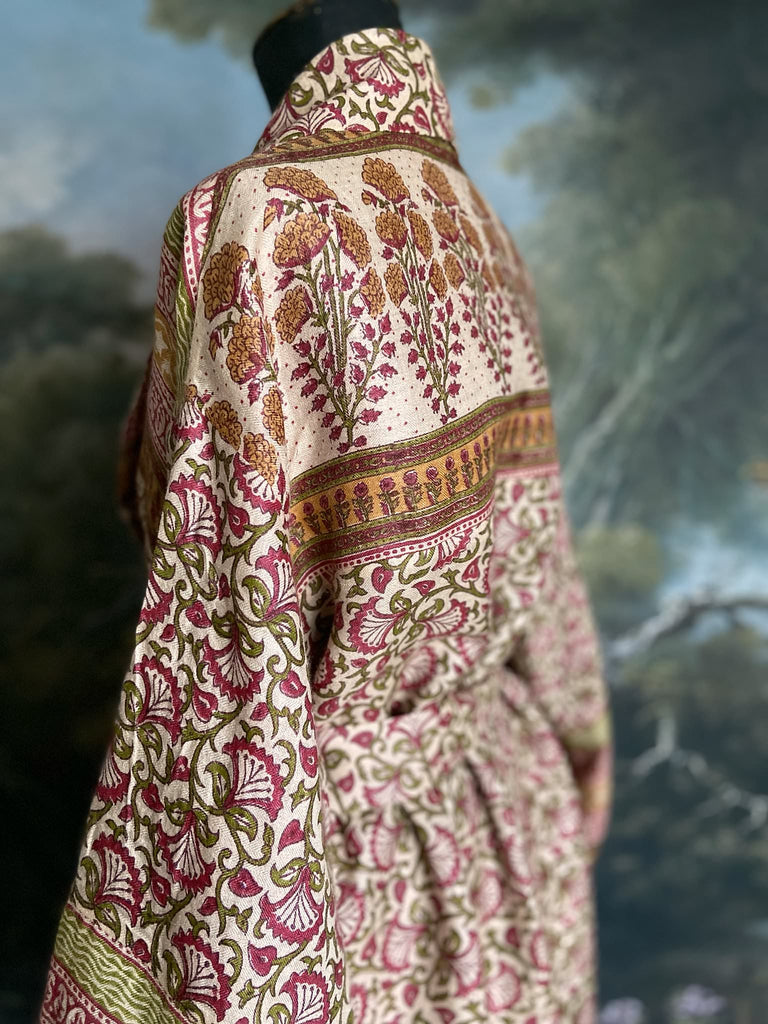 Rose pink and ivory fine wool dressing robe or duster coat with tassel sash, wide sleeves and deep pockets. Lined in silk. Bohemian style sustainably created from antique and vintage textiles by the Pavilion Parade studio.