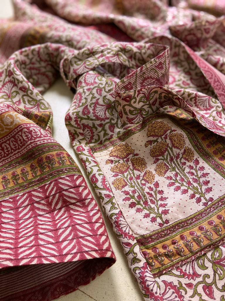 Rose pink and ivory fine wool dressing robe or duster coat with tassel sash, wide sleeves and deep pockets. Lined in silk. Bohemian style sustainably created from antique and vintage textiles by the Pavilion Parade studio.