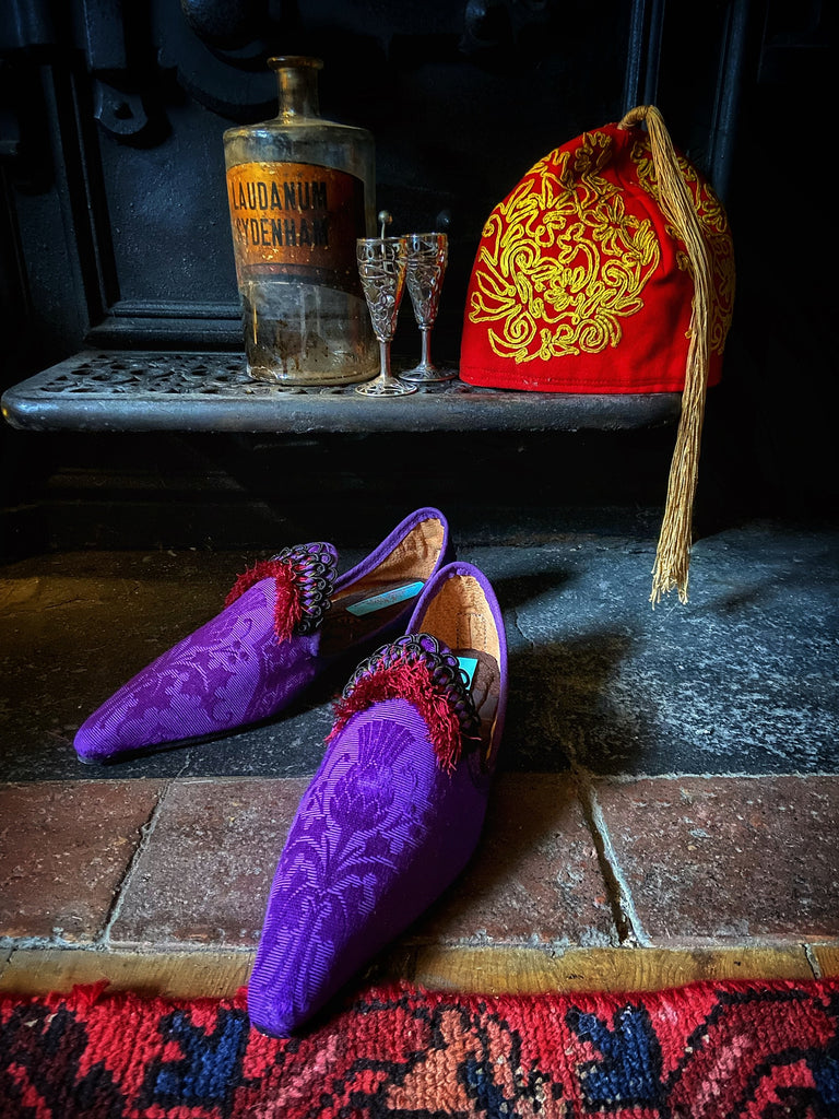 Purple silk shoes with Scottish thistle motif and dark red Florentine tassel fringe and Victorian black silk soutache cord embellishment. Created from antique textiles by Pavilion Parade.