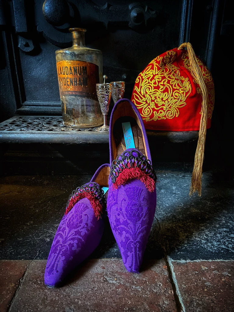 Purple silk shoes with Scottish thistle motif and dark red Florentine tassel fringe and Victorian black silk soutache cord embellishment. Created from antique textiles by Pavilion Parade.