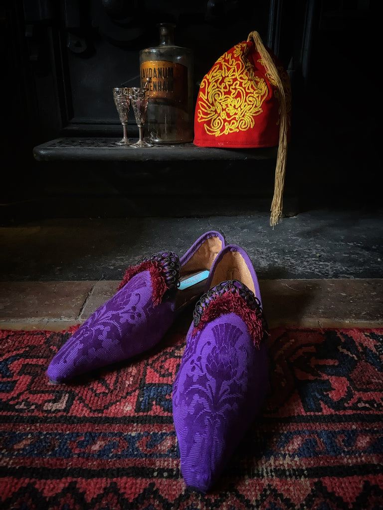Purple silk shoes with Scottish thistle motif and dark red Florentine tassel fringe and Victorian black silk soutache cord embellishment. Created from antique textiles by Pavilion Parade.