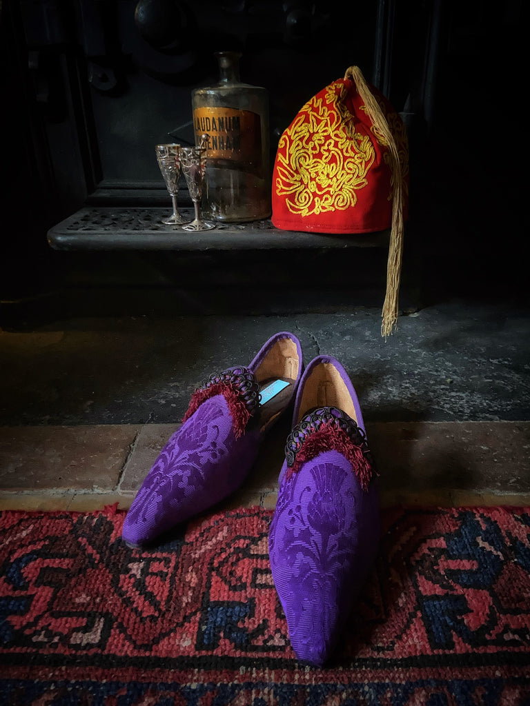 Purple silk shoes with Scottish thistle motif and dark red Florentine tassel fringe and Victorian black silk soutache cord embellishment. Created from antique textiles by Pavilion Parade.