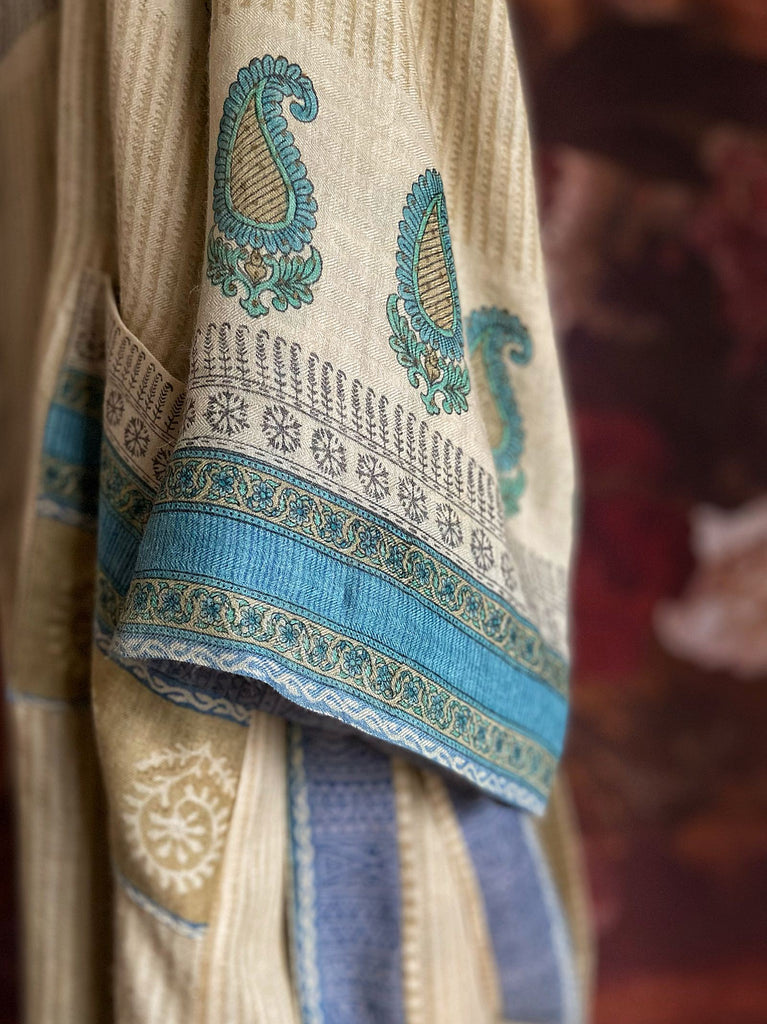 Robins egg blue and parchment fine wool dressing robe or duster coat. Wide cuffs, tassel sash and deep pockets.. Fully lined in silk. Created from vintage textiles by the Pavilion Parade studio.