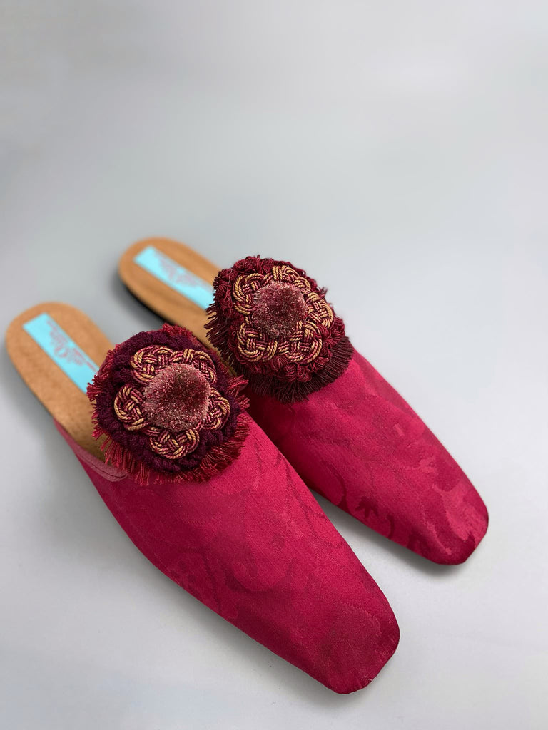Raspberry red 19th century silk damask square toed backless slipper shoes with antique French passementerie silk chenille and cord medallion rosettes. Bohemian style created from antique textiles by the Pavilion Parade studio.