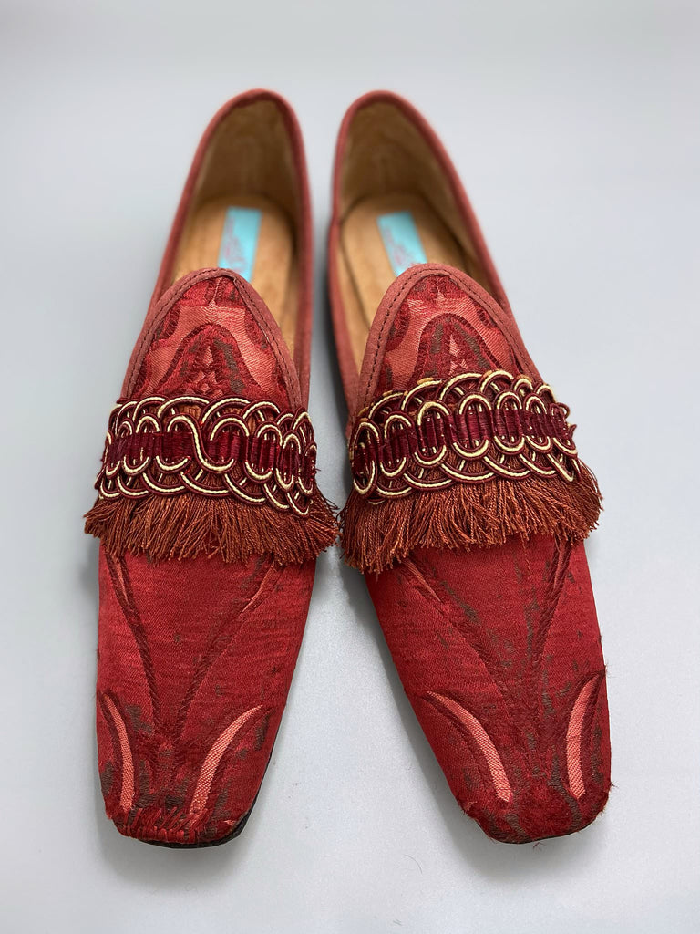 Rust red bohemian shoes created from a fragment of antique Italian silk brocade and assorted tassel and passementerie embellishments by Pavilion Parade