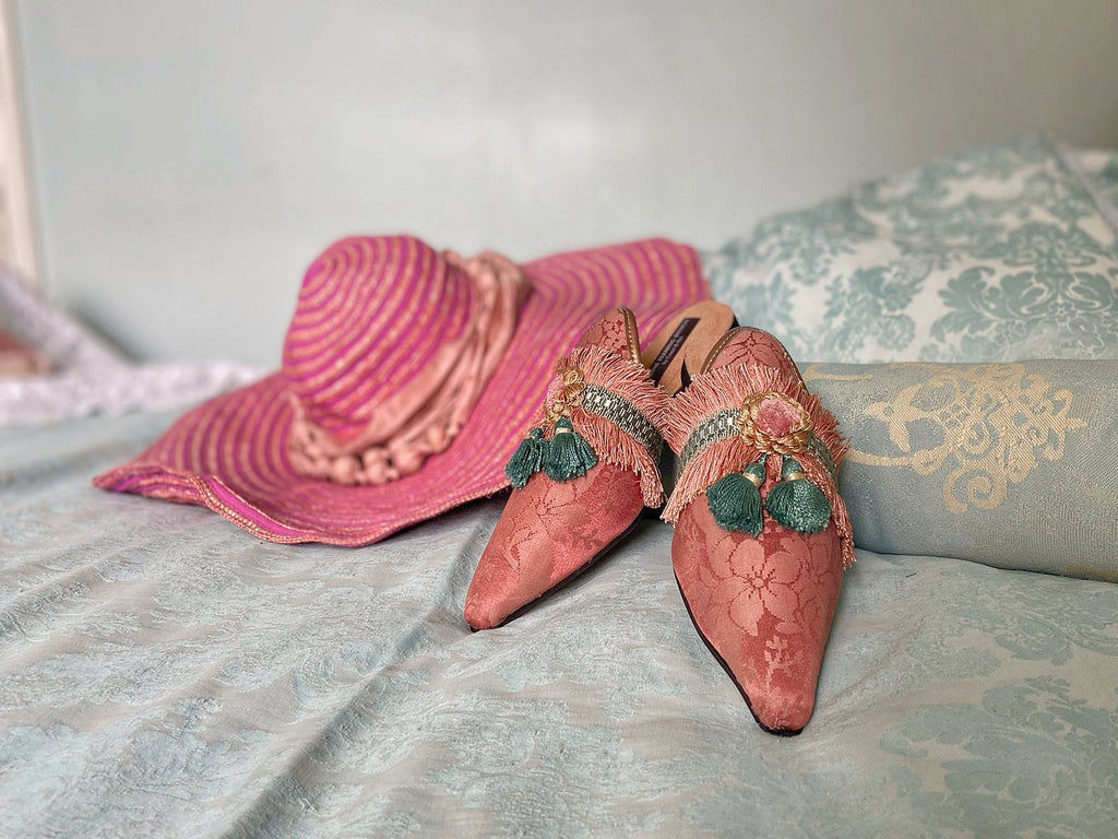 Pavilion Parade handmade bohemian shoes created from antique textiles, from Joanne Fleming Design. 19th century silk damask and tassel fringe form bohemian flat shoes in shades of rose pink and soft teal