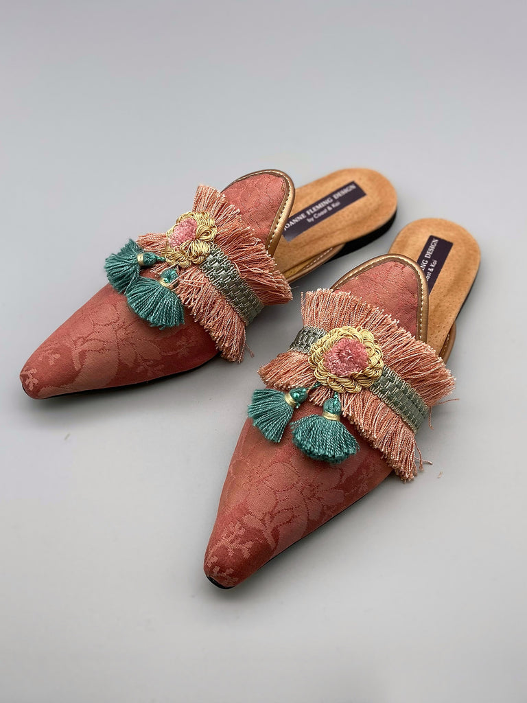 Pavilion Parade handmade bohemian shoes created from antique textiles, from Joanne Fleming Design. 19th century silk damask and tassel fringe form bohemian flat shoes in shades of rose pink and soft teal