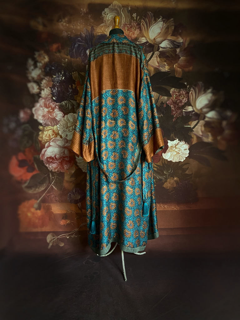 Teal blue and rust fine wool long dressing robe or duster coat with wide sleeves, tassel sash and silk lining. Bohemian style from the Pavilion Parade studio