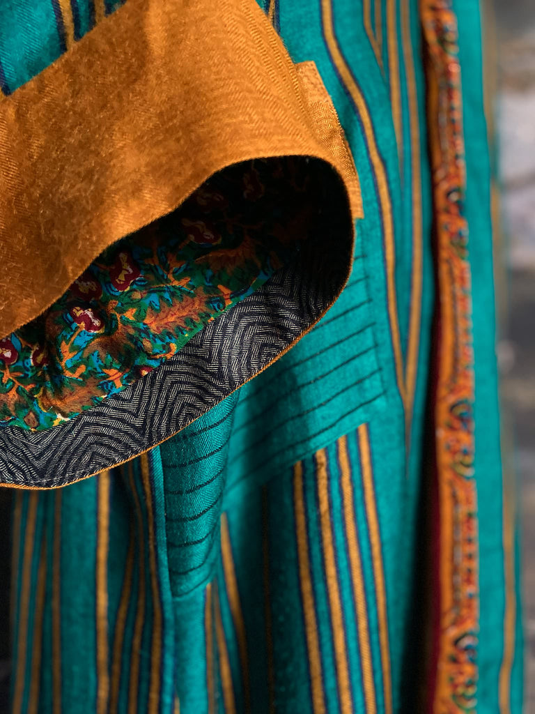 Teal green and canary yellow stripe fine wool robe lined in vibrant block printed silk crepe. Tassel sash belt, deep pockets and wide sleeves, Bohemian style sustainably create from vintage and antique textiles by the Pavilion Parade studio