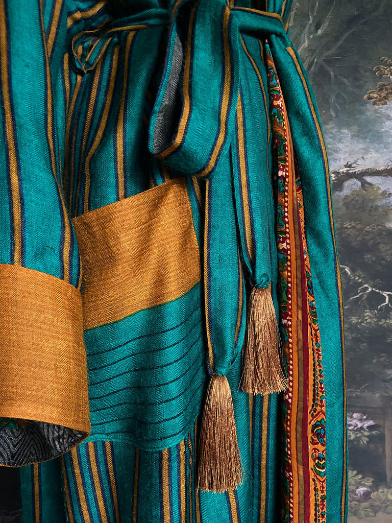 Teal green and canary yellow stripe fine wool robe lined in vibrant block printed silk crepe. Tassel sash belt, deep pockets and wide sleeves, Bohemian style sustainably create from vintage and antique textiles by the Pavilion Parade studio