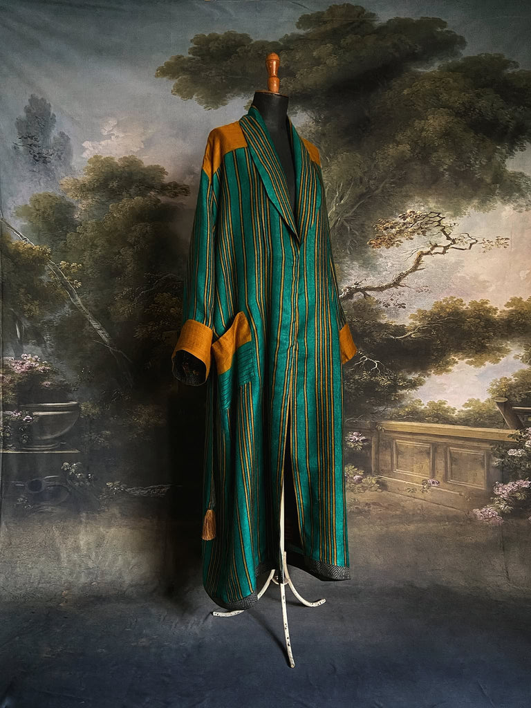 Teal green and canary yellow stripe fine wool robe lined in vibrant block printed silk crepe. Tassel sash belt, deep pockets and wide sleeves, Bohemian style sustainably create from vintage and antique textiles by the Pavilion Parade studio
