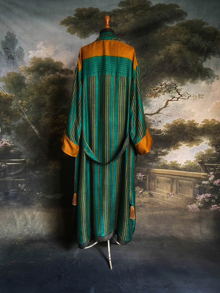 Teal green and canary yellow stripe fine wool robe lined in vibrant block printed silk crepe. Tassel sash belt, deep pockets and wide sleeves, Bohemian style sustainably create from vintage and antique textiles by the Pavilion Parade studio