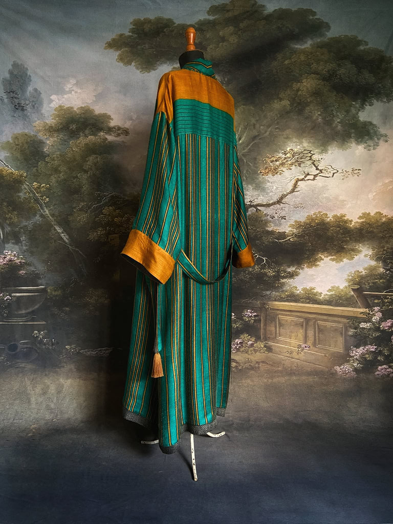 Teal green and canary yellow stripe fine wool robe lined in vibrant block printed silk crepe. Tassel sash belt, deep pockets and wide sleeves, Bohemian style sustainably create from vintage and antique textiles by the Pavilion Parade studio