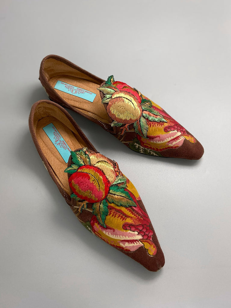 Vibrant colourful bohemian shoes created from an antique French  block printed Indienne cotton, with a design of fantastical flowers and foliage  and embroidered fruits. Sustainably made from antique textiles by Pavilion Parade