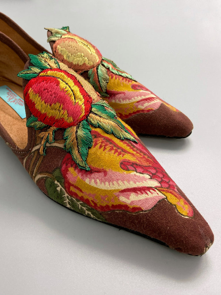 Vibrant colourful bohemian shoes created from an antique French  block printed Indienne cotton, with a design of fantastical flowers and foliage  and embroidered fruits. Sustainably made from antique textiles by Pavilion Parade