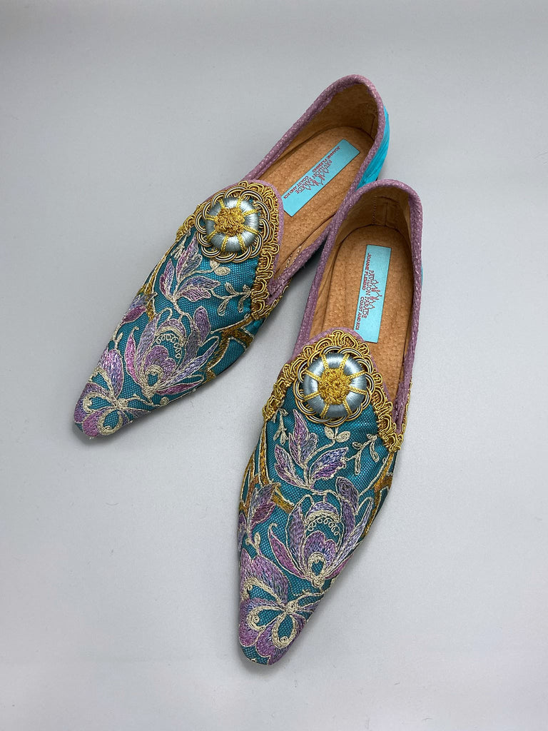 Pointed toe shoes created from antique lilac and gold lace over azure blue silk, with gold braid and vintage Passementerie rosette embellishment. Created by Pavilion Parade.
