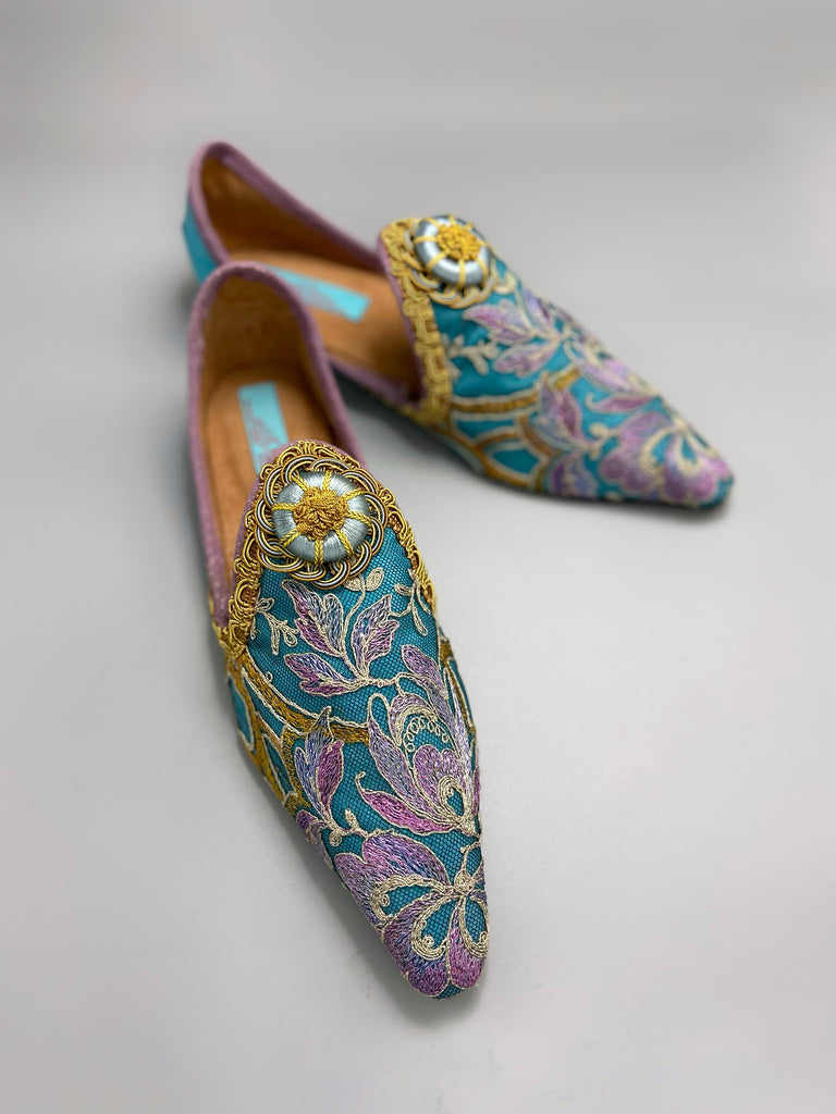 Pointed toe shoes created from antique lilac and gold lace over azure blue silk, with gold braid and vintage Passementerie rosette embellishment. Created by Pavilion Parade.